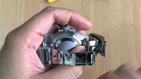 removing rolex bracelet from strap.